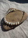 MILESTONES handmade freshwater pearl and 14k gold-filled bracelet on natural stone