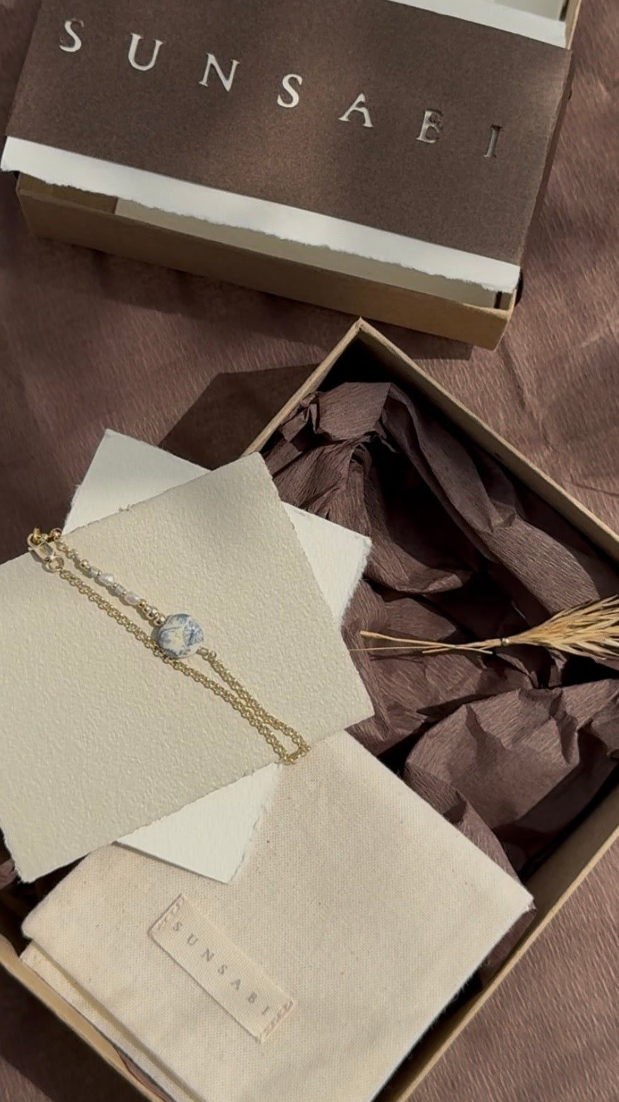 SUNSABI Portobello Sky bracelet with a vintage blue floral Japanese Tensha bead, freshwater pearl and 14k gold-filled details
